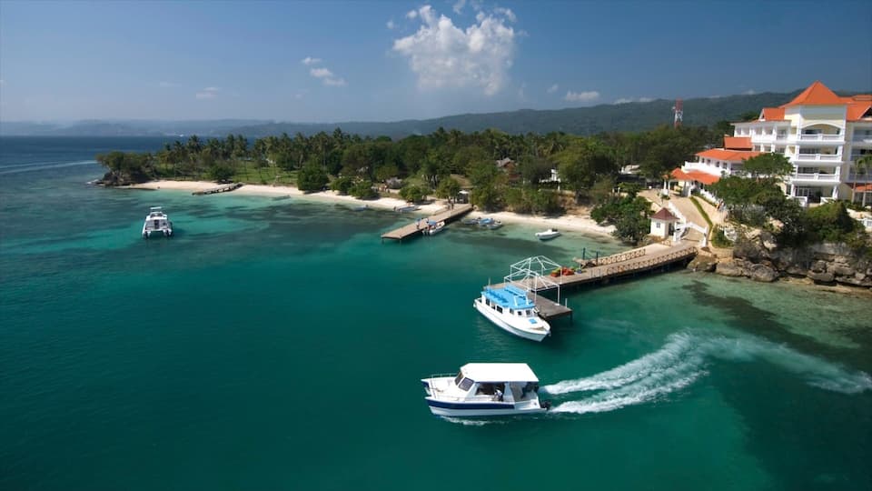 Dominican Republic featuring boating, island images and a luxury hotel or resort