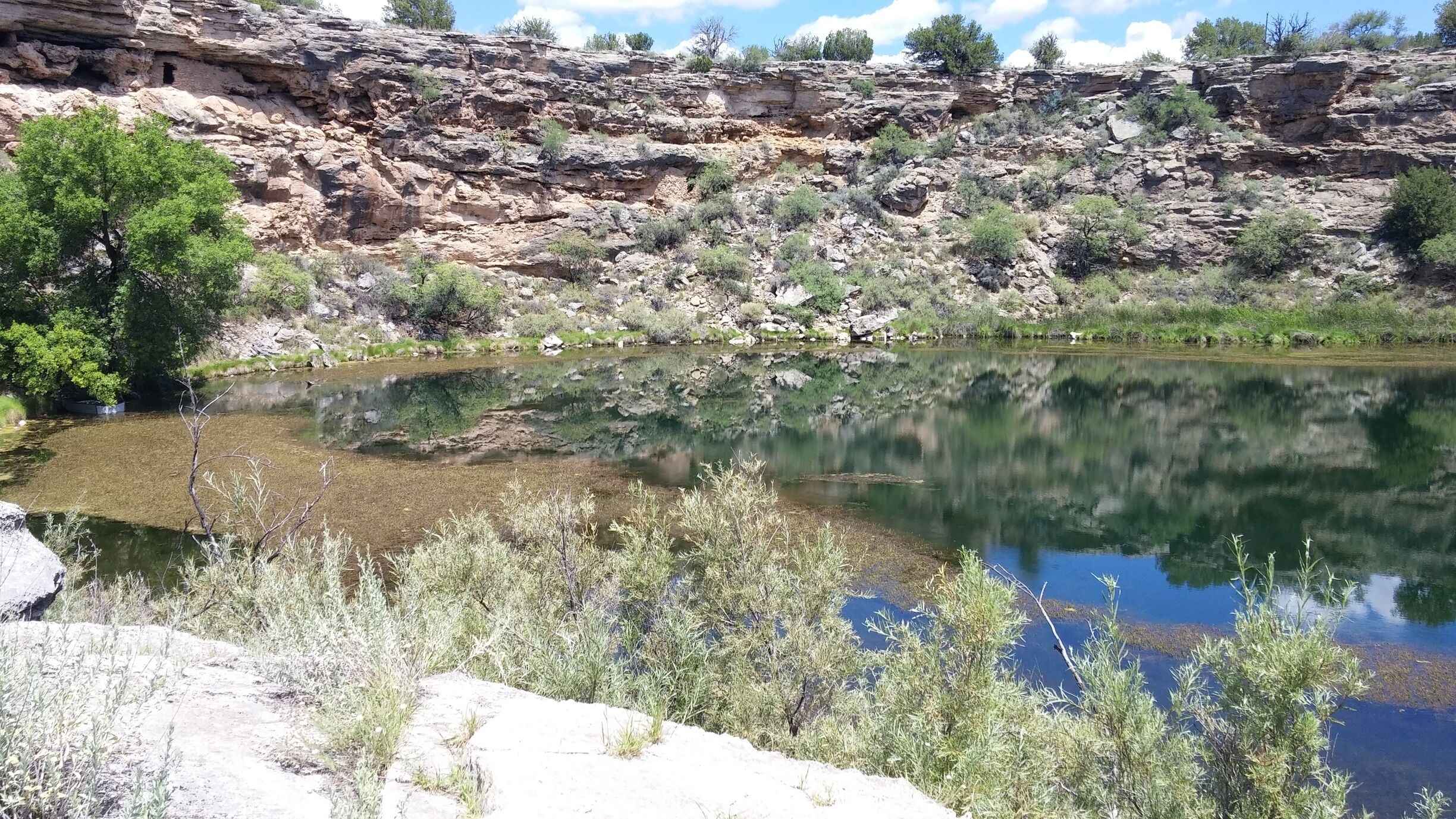 Desert oasis that is surrounded by ancient Native American dwellings. 