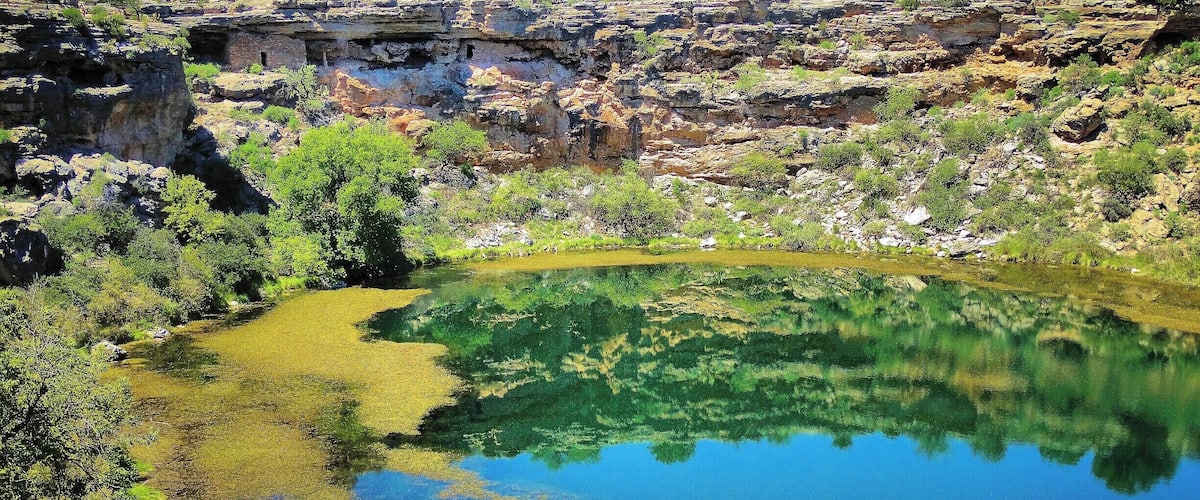 Most people are so focused on nearby Sedona that they miss a lovely hike around Montezuma's Well, full of history, culture, and wildlife (a juvenile rattlesnake shot out from the bushes as my foot was coming down and I stepped on it and immediately jumped a mile high and screamed, but don't let that scare you).
http://www.liferidingshotgun.com/2015/01/arizonas-national-parks-monuments.html