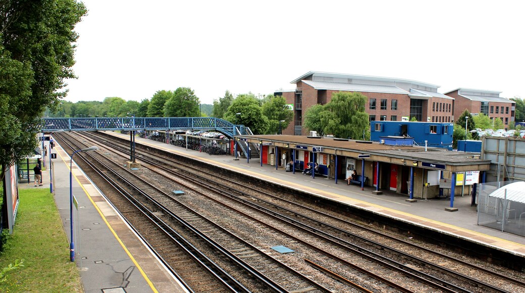 A view of Fleet railway Station from the pedestrian bridge on the Down side of the station. The blue portacabins behind the station building were being used by the building company who demolished the station a few weeks after the picture was taken