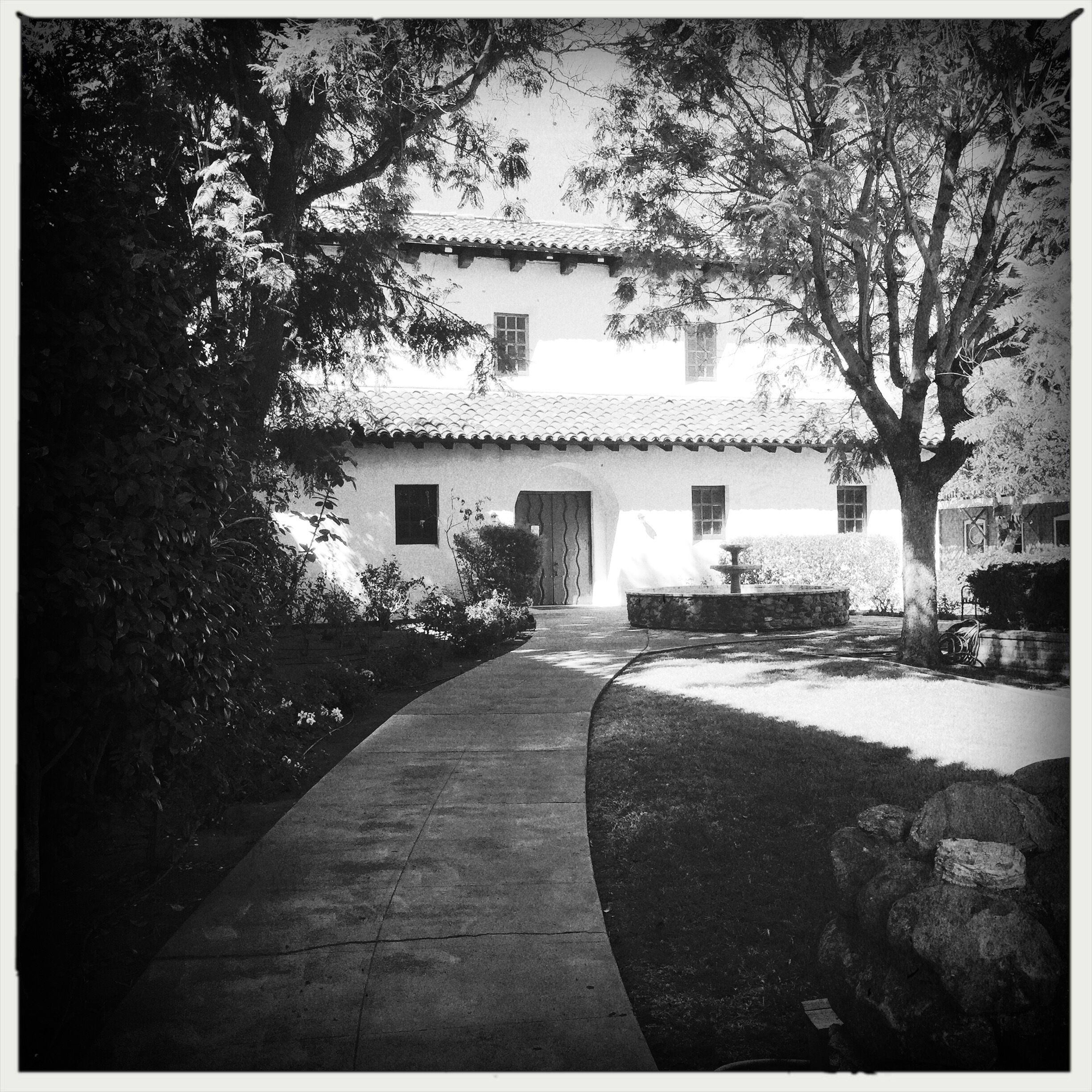 Outside the Mission next to the chapel. 