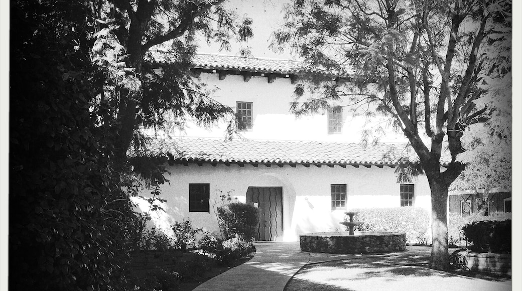 Outside the Mission next to the chapel.