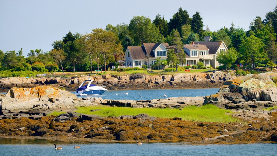 Bailey Island which includes a house and rocky coastline