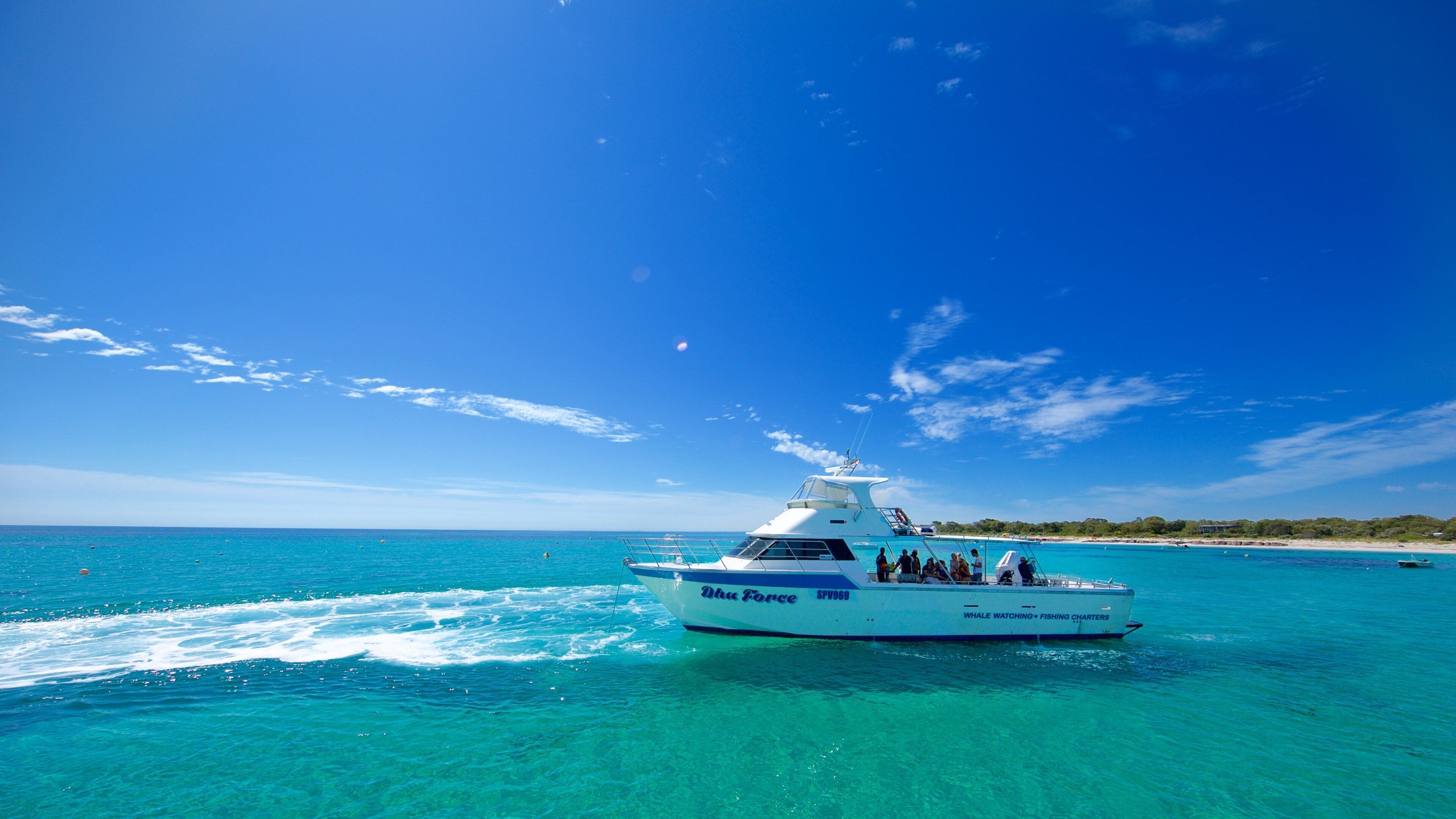 Western Australia featuring boating and general coastal views as well as a small group of people