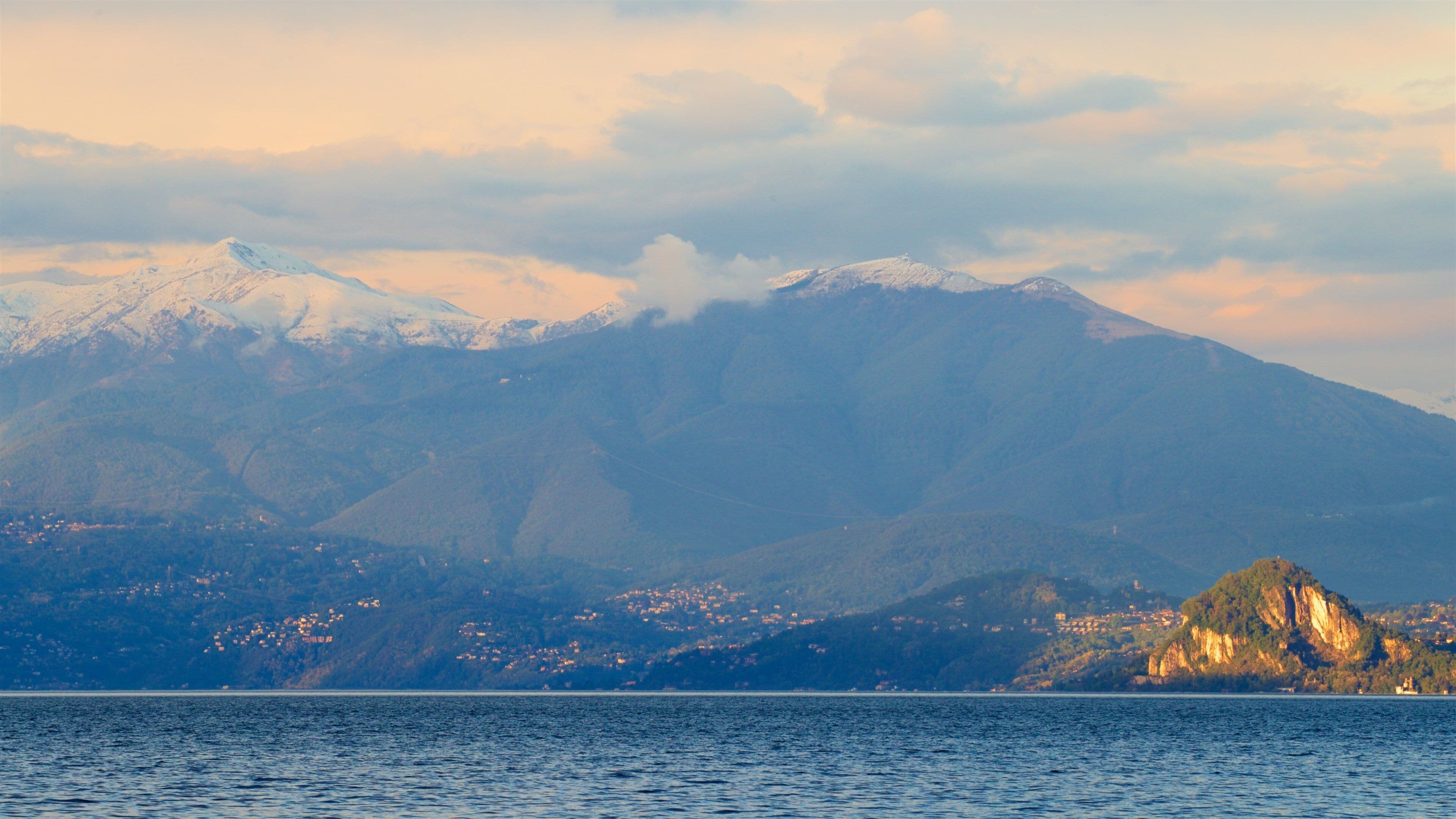 Lake Maggiore featuring a lake or waterhole and mountains