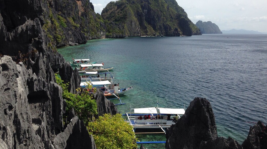 You need to climb on a man made rock stairs to enjoy this beautiful view of the island