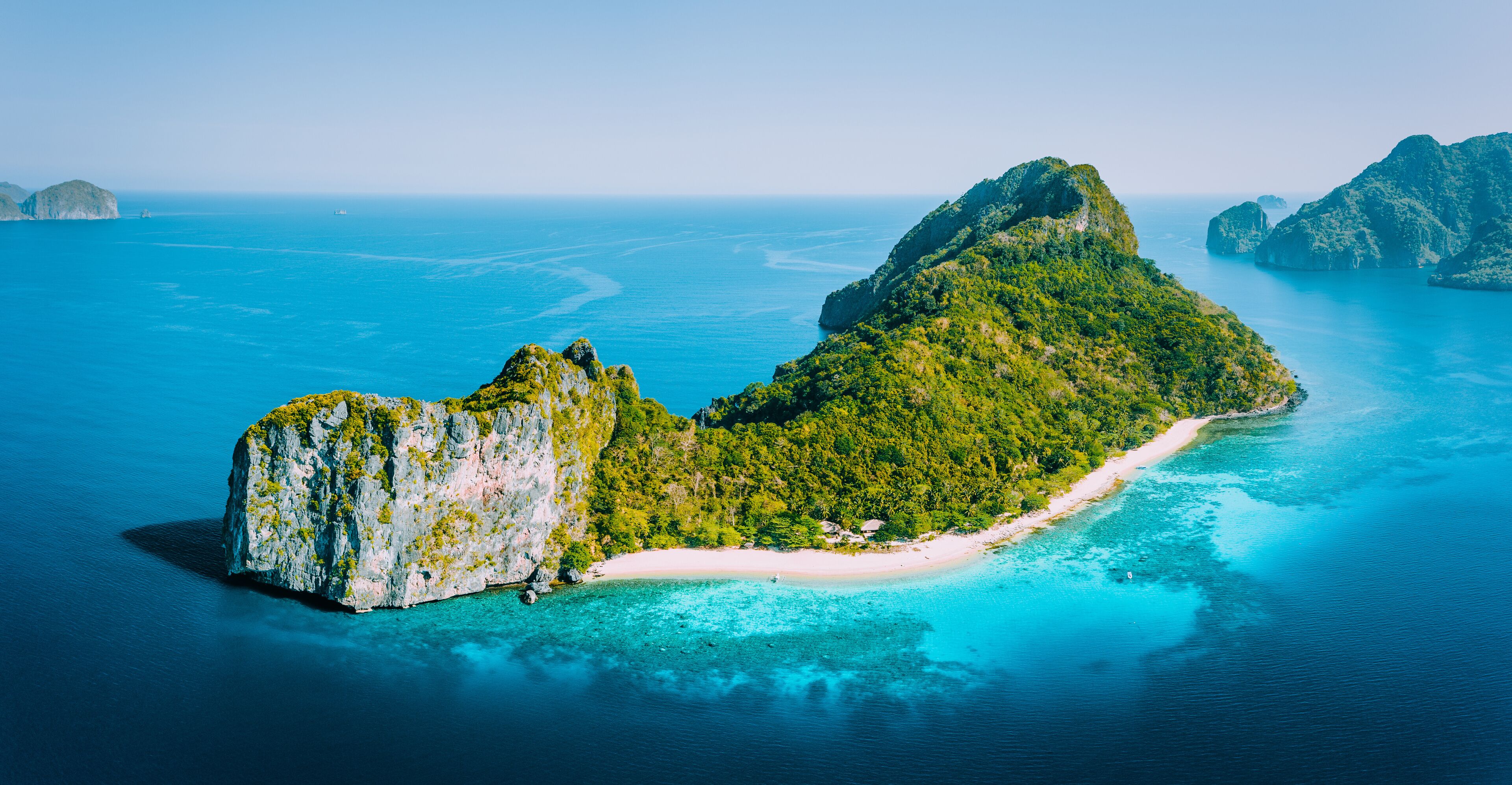Early Morning drone Aerial Panorama view of Helicopter Island in the Bacuit Bay in El Nido, Palawan, Philippines