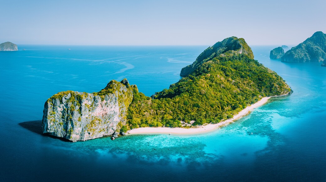 Early Morning drone Aerial Panorama view of Helicopter Island in the Bacuit Bay in El Nido, Palawan, Philippines