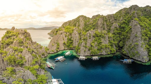 Aerial view of Twin Lagoon on paradise island with sharp limestone rocks, tropical travel destination - Coron, Palawan, Philippines.