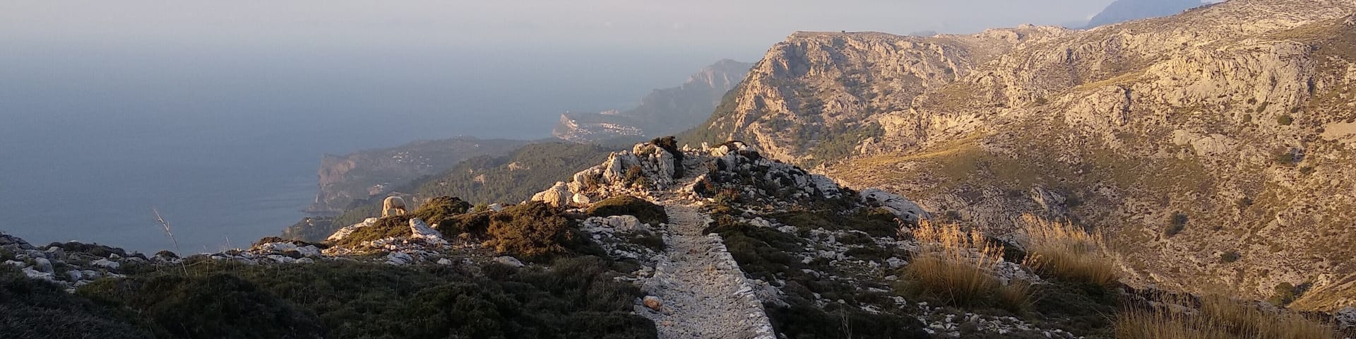 The Serra de Tramuntana is a mountain range on Mallorca which was awarded the World Heritage Status by UNESCO in 2011. It is a beautiful, very well preserved area with wonderful hiking trails. This photo was shot a few weeks ago on one of its many peaks at sunset. While no human appeared to have been anywhere on the mountain, there were many wild goats and sheep enjoying the last moments of sunlight (if you look close, you can see a sheep on the left). #LeaveNoTrail, #LifeAtExpedia