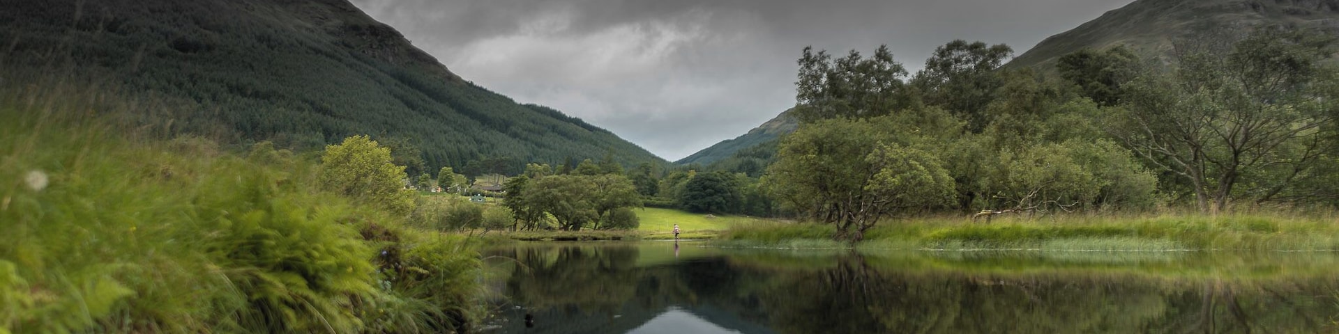 Getting to this location was a rare challenge. I have booked this stay with family and friends on my way to Isle of Skye and didn't arrive to Loch Lomond National Park until nearly midnight. We were told the road has some potholes and arrived in two fully loaded saloon cars as sadly had no other option. The road was truly bad but if we passed it then most of the cars will as well. We didn't get to see the landscape until we have awoken the next morning, although the abundance of stars and a hooting of a tawny owl at 1 am was mesmerising. In the morning the weather was pretty somber but it hasn't taken away the beauty of Loch Voil. I went for a walk alongside the loch but didn't meet anyone at all. Walks at Loch Voil are truly good for the soul.
#reflections #Landscape #britain #uk #Scotland #loch #lake #summer #nature #scottishnature #gooutside #greatoutdoors #visitscotland