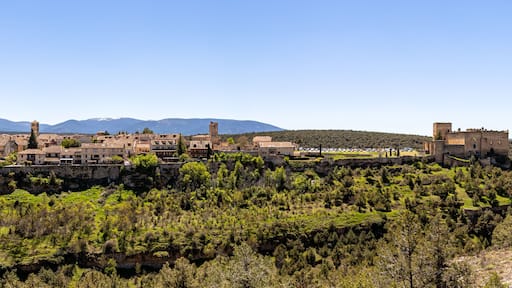 Pedraza, Castilla Y Leon, Spain: panorama of Pedraza village from Mirador the Tungueras, with the Sierra de Guadarrama behind. Pedraza is one of the best preserved medieval villages of Spain