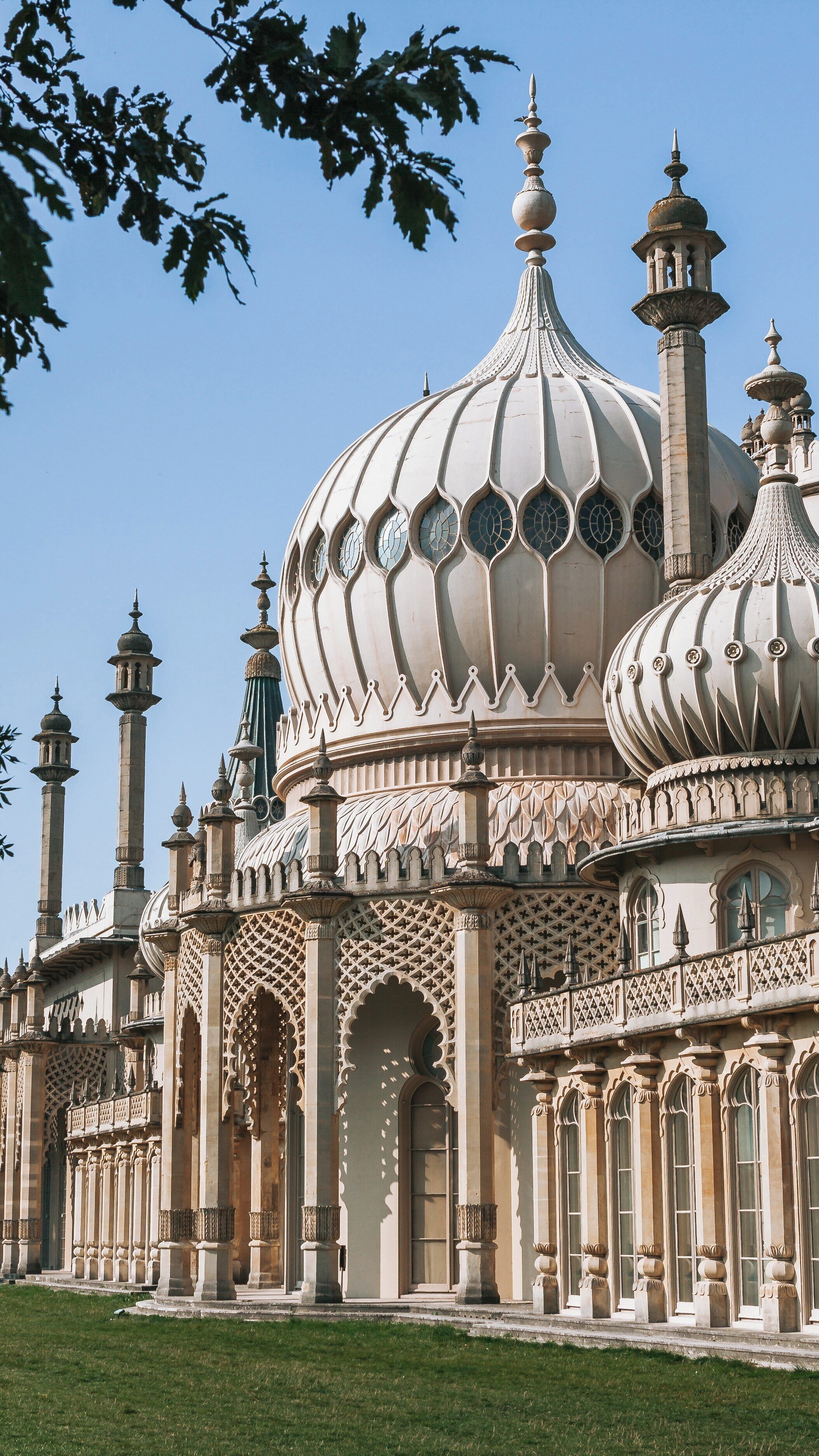 Brighton Royal Pavilion showcasing intricate architecture in the cultural quarter of Brighton city center, England, under a clear blue sky