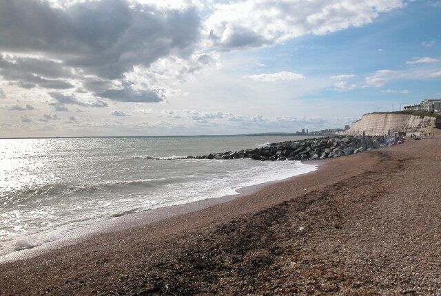 Rottingdean Beach - Westwards. Looking westwards towards Brighton and Brighton Marina in distance. One is able to walk along the undercliff walk to the Marina