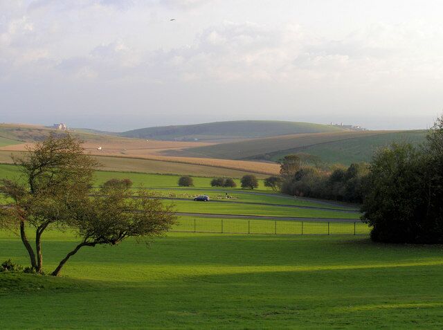 Castle Hill Roedean, nr Ovingdean The building to the left is St Dunstan's which provides important services to blind servicemen and women. TQ361027 The building to the right behind Castle Hill is Roedean Girl's School TQ349032 In the foreground is Woodingdean Lawn Cemetery.