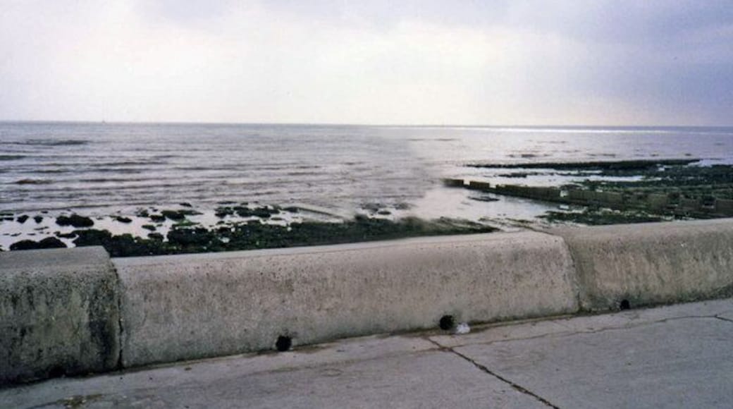Undercliff Walk, near Rottingdean, East Sussex Note the rocky shore and groynes.
