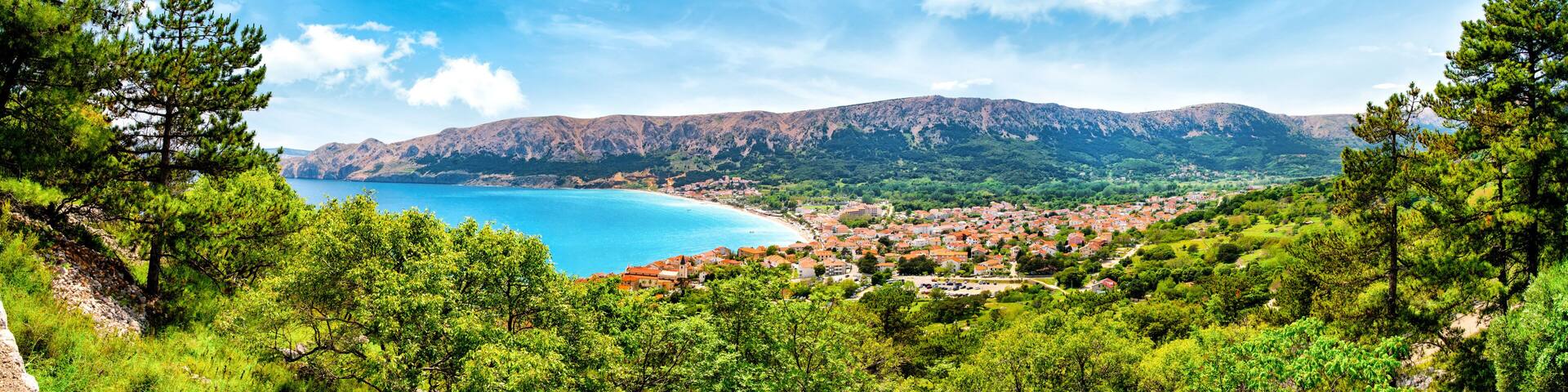 Panorama view over the natur, coast and the town of Baska on the island of Krk. Beautiful romantic summer scenery on the Adriatic Sea. Croatia. Europe.