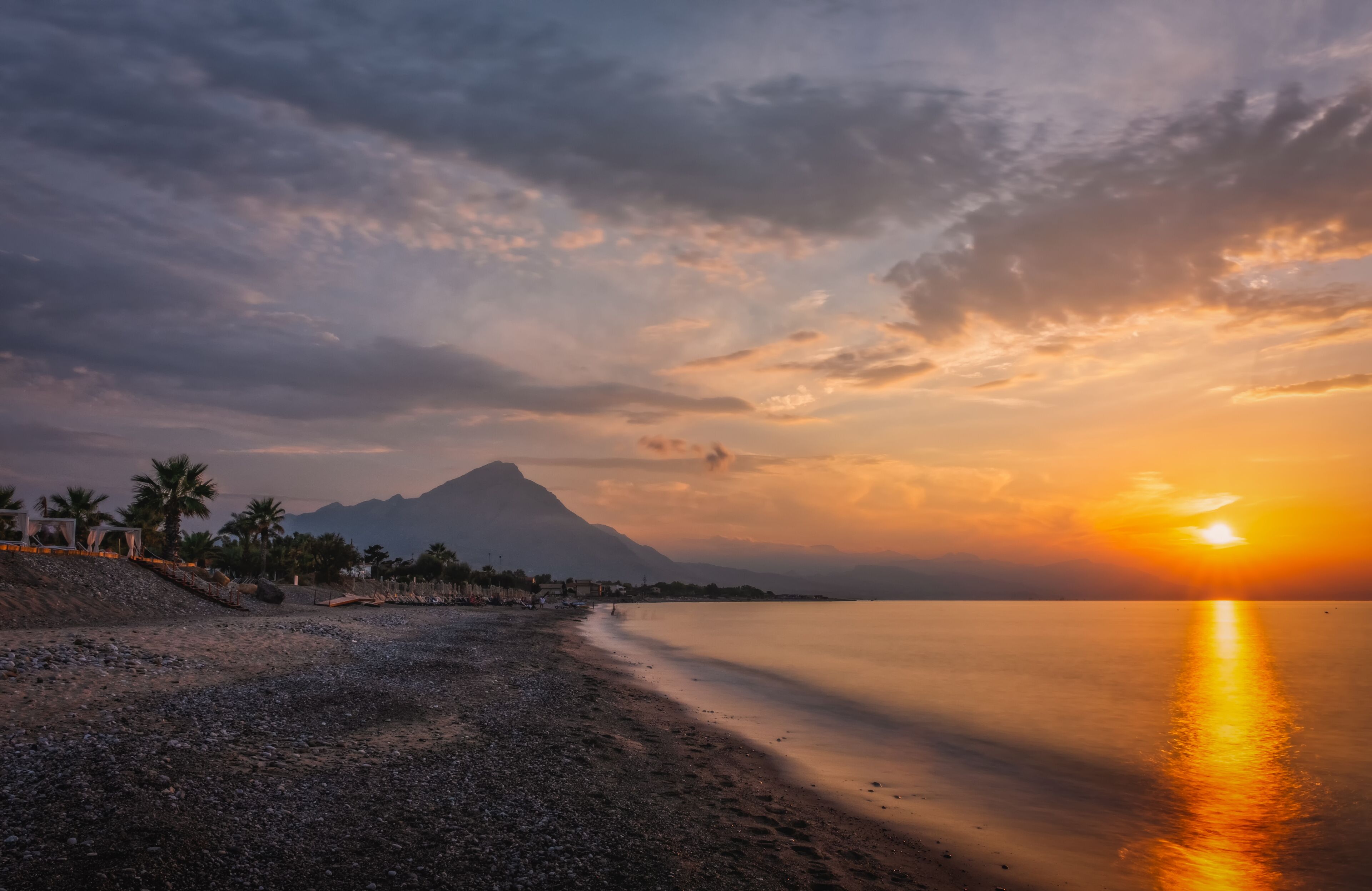 Sunset on the beach of the city of Campofelice di Rosaria in northwestern Sicily. August 2024