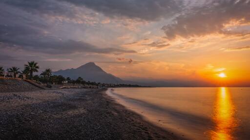 Sunset on the beach of the city of Campofelice di Rosaria in northwestern Sicily. August 2024