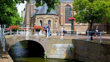 The Hague featuring a river or creek, heritage elements and a bridge