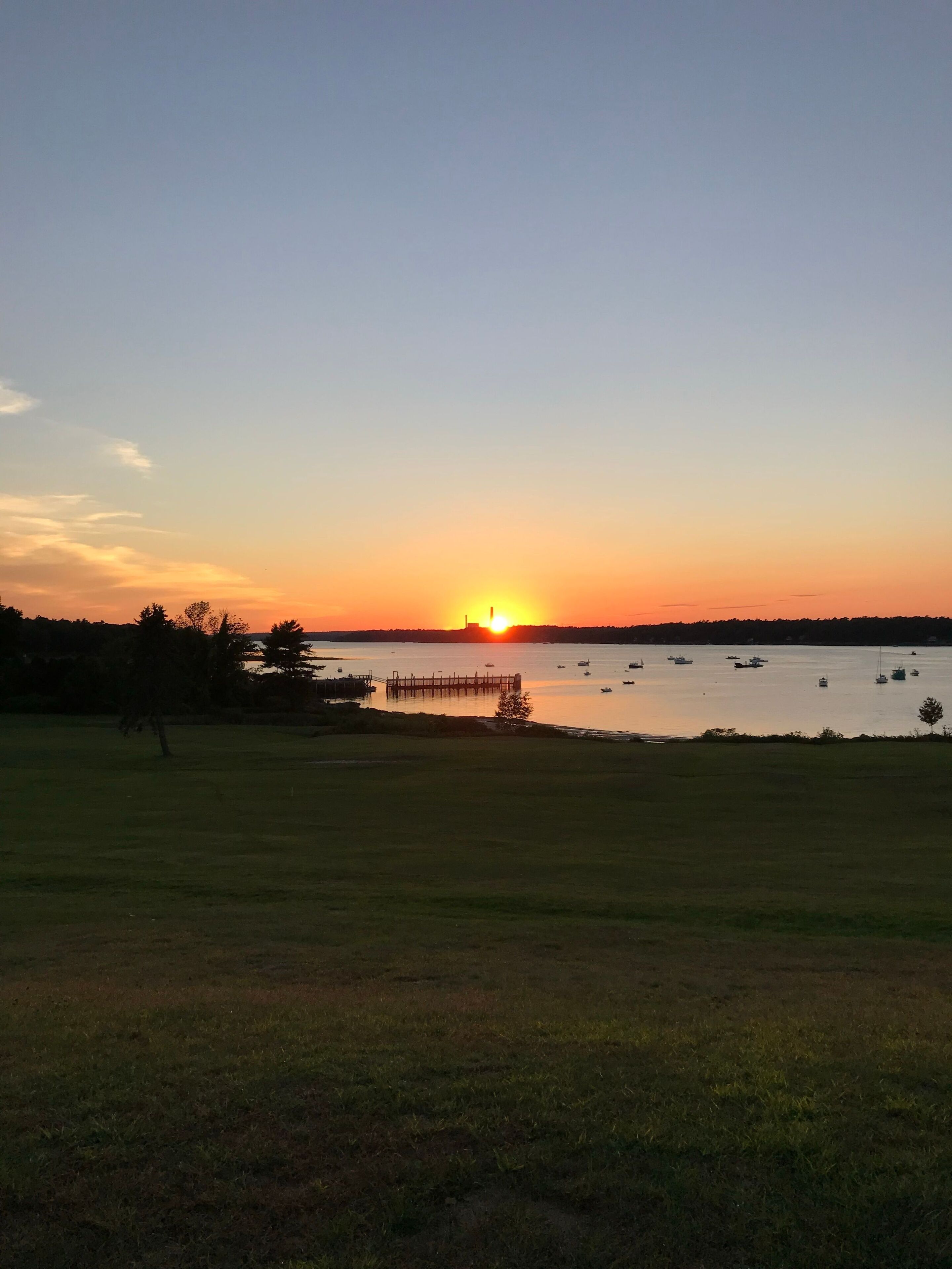 Tranquil golf course landscape featuring a stunning sunset. Chebeague Island, Maine, USA.