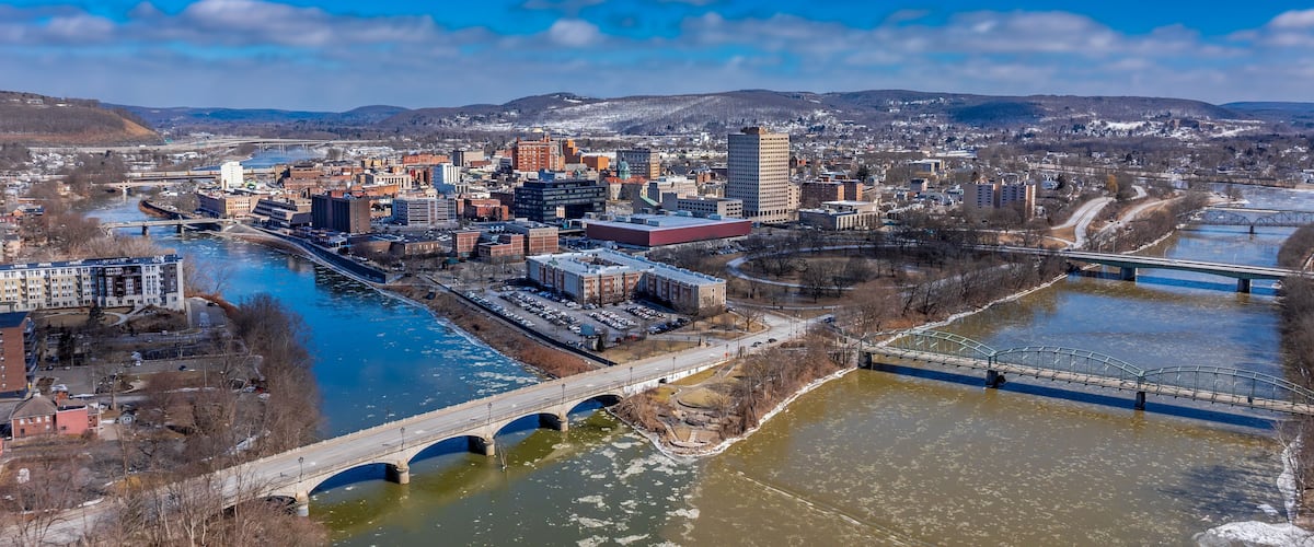 Binghamton, NY, USA - 03-02-2025: Winter afternoon aerial photo over downtown Binghamton, NY.
