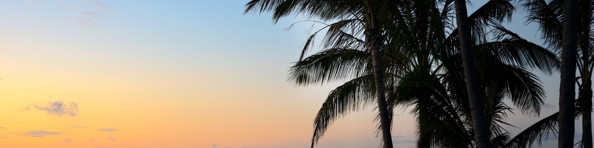 Hamilton Island which includes general coastal views and a sunset