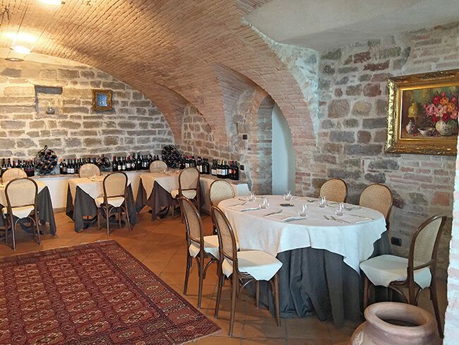 Bettona is a beautiful little town with Etruscan origins. The city wall is still intact all around the city and is in good condition. The city also has a restaurant recommended by the Michelin guide, but without stars. So of course we chose Taverna del Giullare for lunch. The place is part of Relais La Corte di Bettona and is located around 150 meters from the main square. The view of the valley is spectacular and the food is highly recommended.
Read more on: http://www.travelwithallsenses.com/umbria-beautiful-fortified-cities/