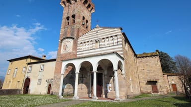 A historic church with a bell tower and a clock.