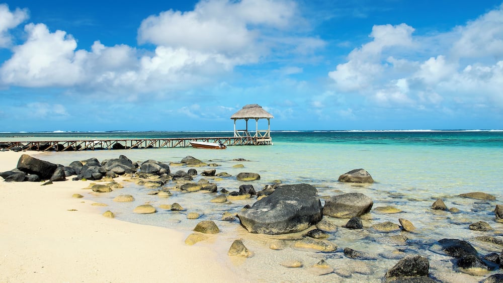 Wooden pier in Bel Ombre beach, Mauritius island
