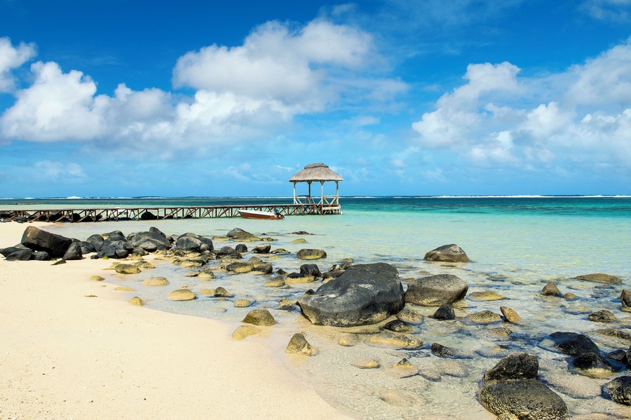 Wooden pier in Bel Ombre beach, Mauritius island