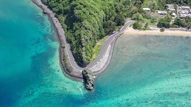 Coastal road facing the turquoise lagoon, aerial view by drone, Bel Ombre, Baie Du Cap, South Mauritius, Indian Ocean, Africa