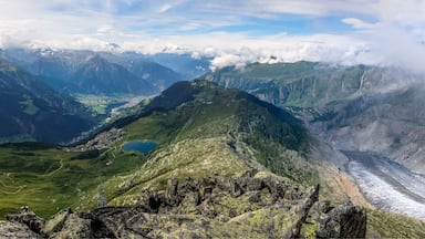 View from the summit of Bettermhorn over Riederalp, Bettmeralp, the Great Aletsch Glacier and the Valais. The hike from the Bettmerhorn cable car station to the summit isn’t long but contains some narrow and exposed sections. Probably not a good idea if you are afraid of heights ... #aboveitall