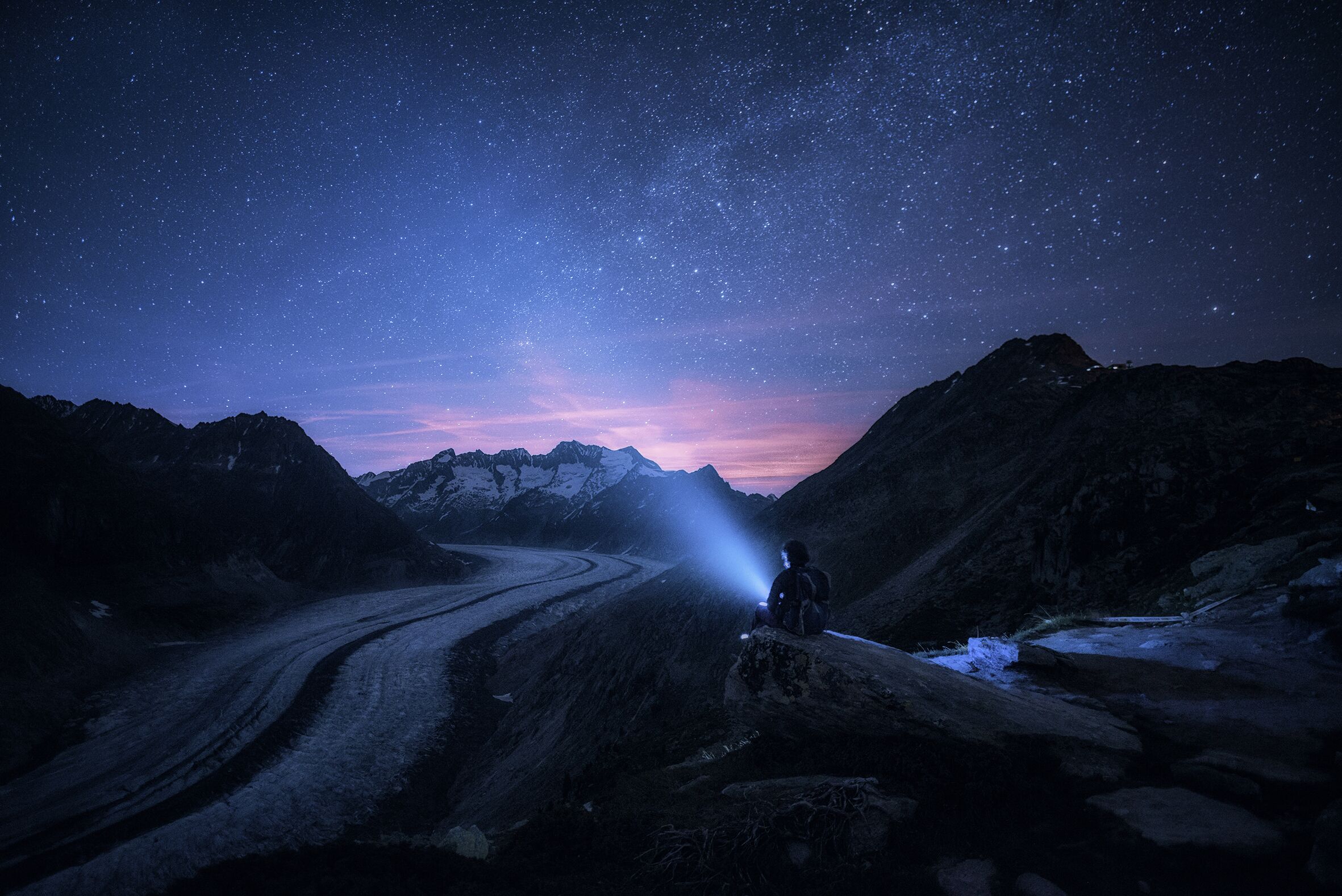 This photo is a bit of special #adventure memory for me, as I took this photo the night after my birthday. While I was getting old, and thinking how small we are compared to the infinite time and scale of the universe, the glacier was saying it out loud with a rocking sound of cracking ice. Aletsch glacier - the longest glacier in the alps, but it shrinks every year, and it might disappear one day. I could have easily stayed there the whole night, but I had to go, as in the morning I had to run half marathon up and along the slopes of the glacier again.