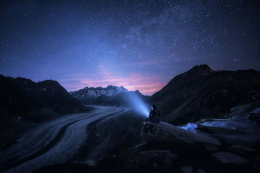 This photo is a bit of special #adventure memory for me, as I took this photo the night after my birthday. While I was getting old, and thinking how small we are compared to the infinite time and scale of the universe, the glacier was saying it out loud with a rocking sound of cracking ice. Aletsch glacier - the longest glacier in the alps, but it shrinks every year, and it might disappear one day. I could have easily stayed there the whole night, but I had to go, as in the morning I had to run half marathon up and along the slopes of the glacier again.