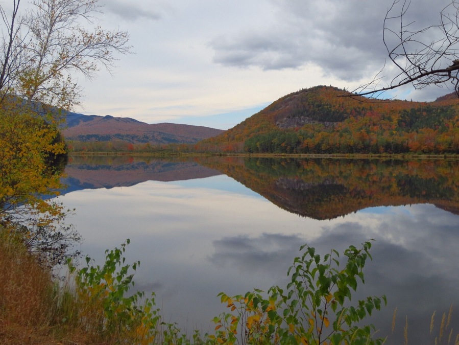 A completely reflective body of water produces awesome photos, even if the sky isn't blue. Autumn in Northern New England is a truly awesome time of year!
