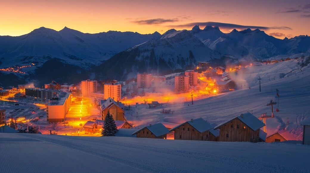 Majestic ski resort with dawn lights, La Toussuire, France