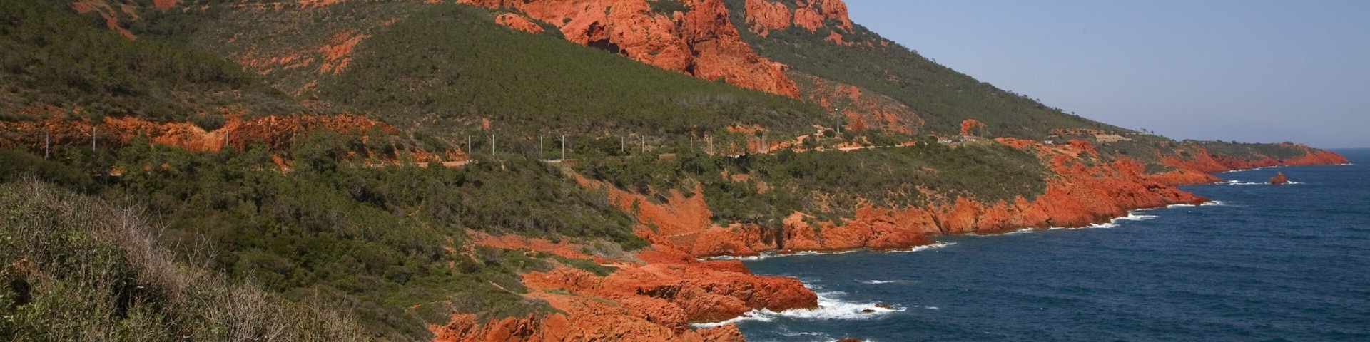Saint-Raphael featuring rocky coastline, general coastal views and mountains