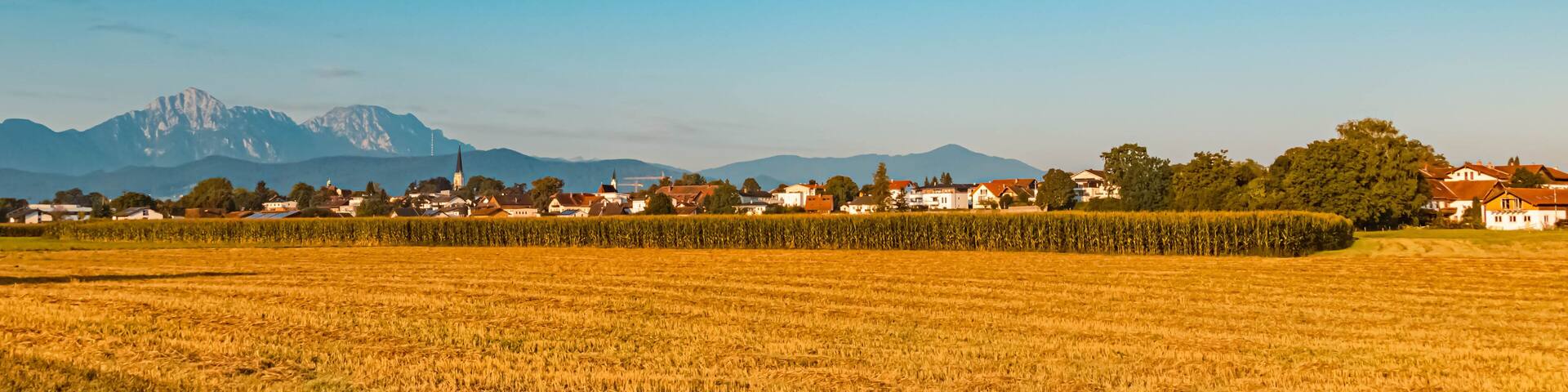 Beautiful alpine summer view with the famous Hochstaufen summit in the background near Freilassing, Bavaria, Germany