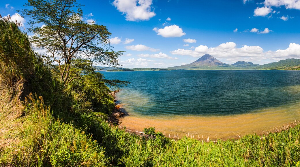 Arenal Volcano behind Laguna de Arenal (Arenal Lake)