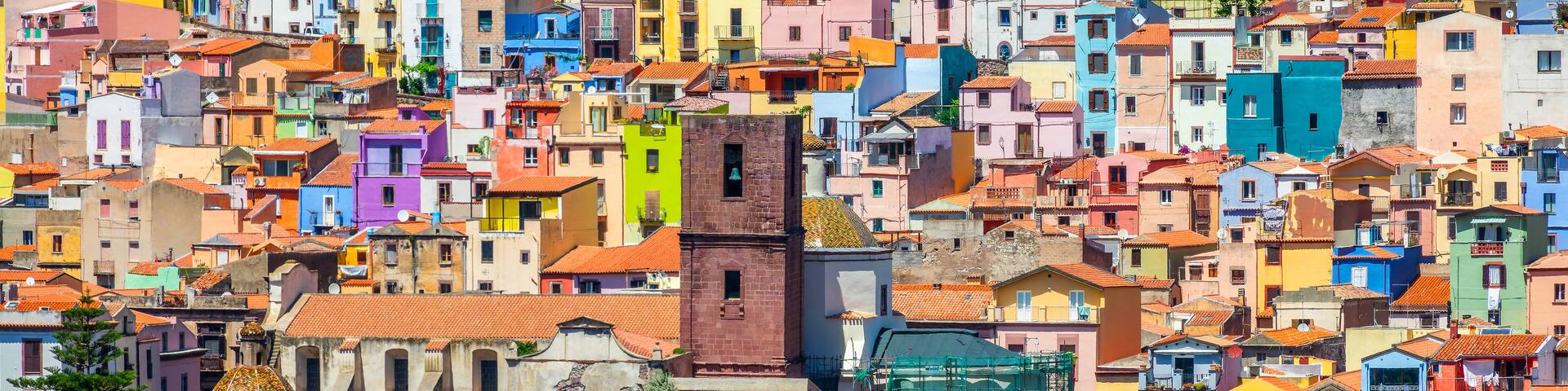 Panoramic view of colorful houses in the old town of Bosa, Sardinia island panorama, Italy