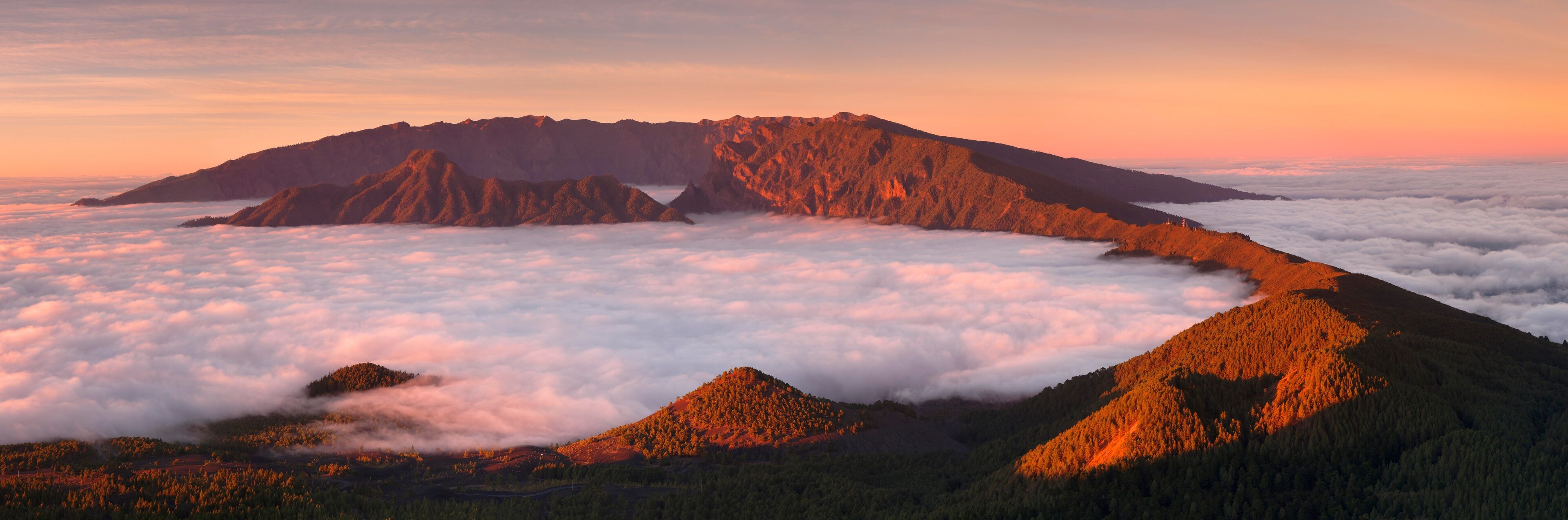 Cumbre Nueva and Cumbre Vieja mountains at sunset above clouds, La Palma, Canary Islands, Spain, Europe