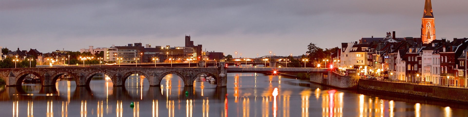 Maastricht which includes a city, a river or creek and a bridge