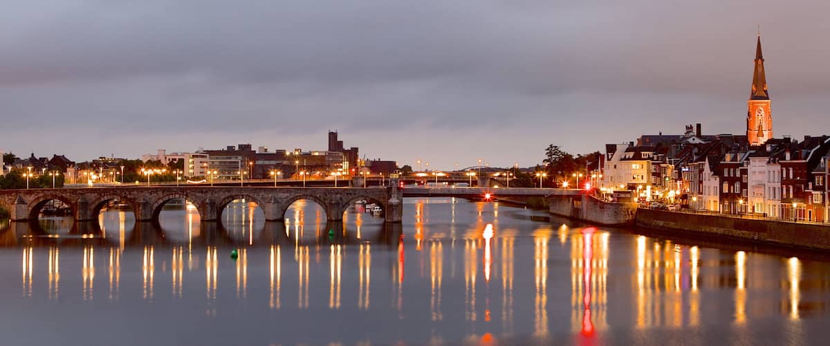 Maastricht featuring a bridge, a city and a river or creek