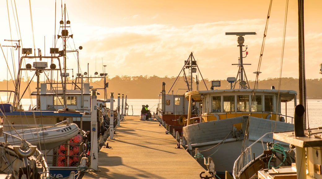 St Helens which includes a bay or harbor, boating and a sunset