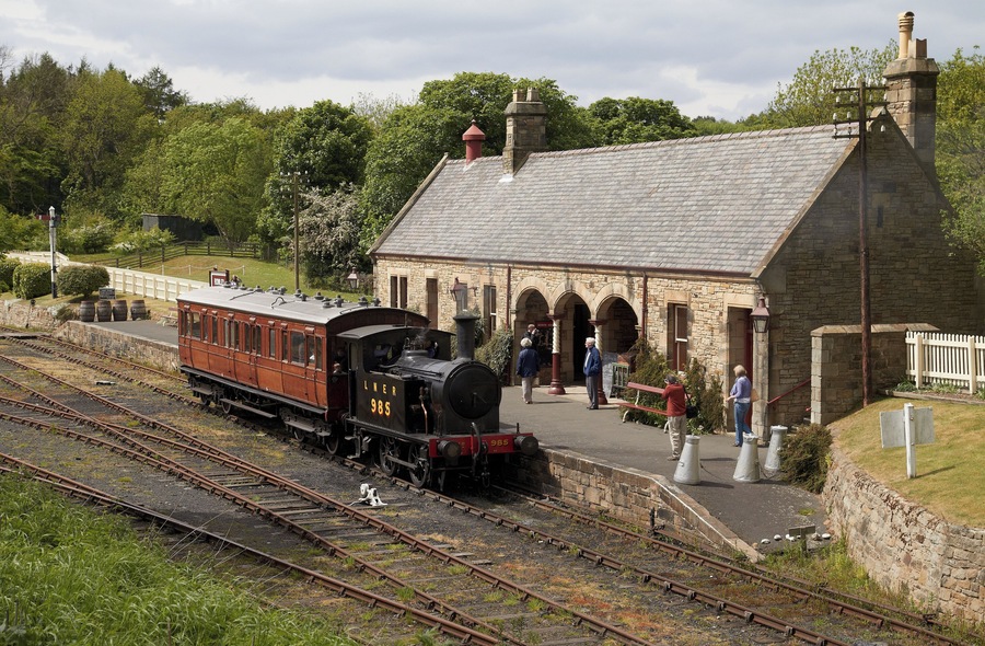 Beamish Museum, County Durham, England. This is the single platform station on the Town railway, seen from the opposite embankment, to the south east. LNER Y7 NO. 985 is in steam.