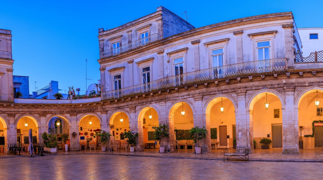 Martina Franca, Apulia, Italy. Panorama of the Piazza Plebiscito and the San Martino Church at blue hour.