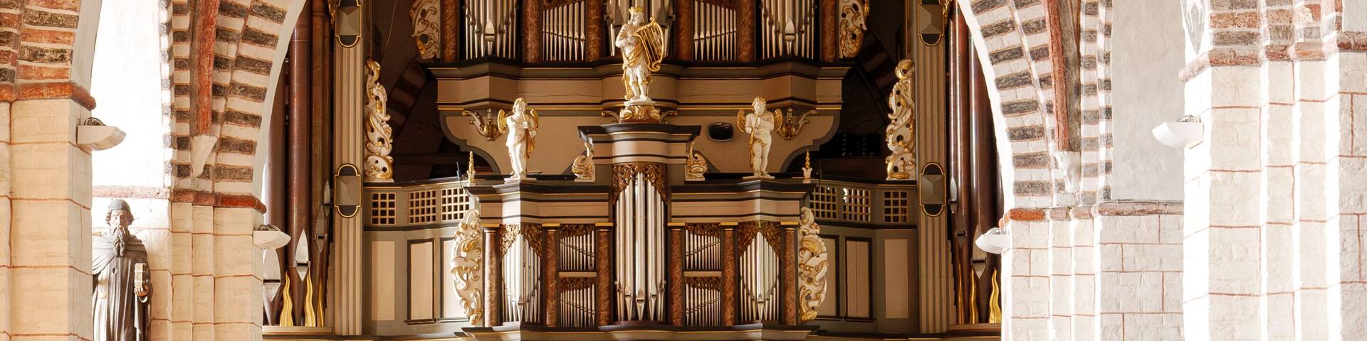 Interior of St Nicholas Church in Burg auf Fehmarn, Schleswig-Holstein, Germany, hall church with arches and organ