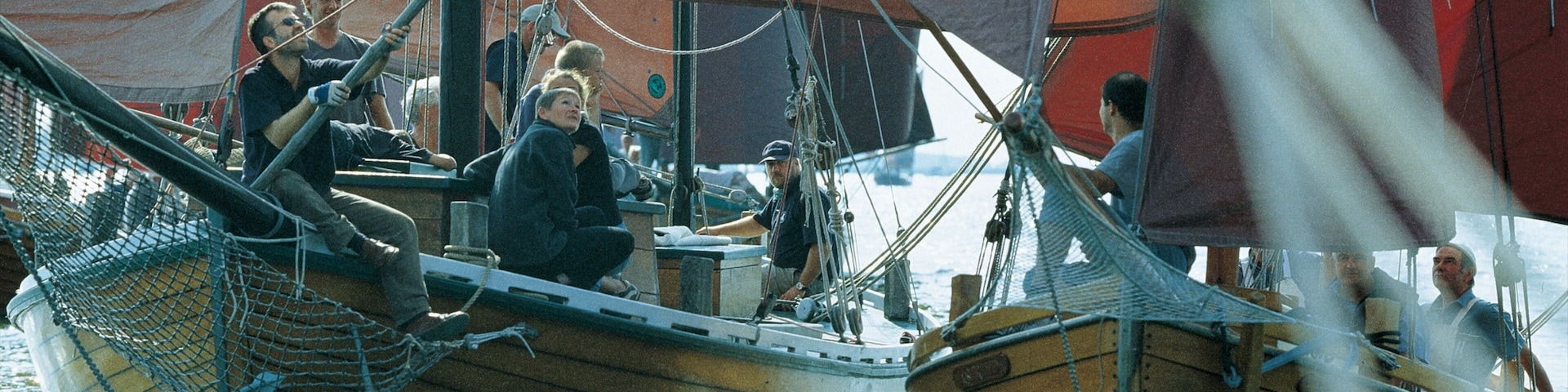 Zingst featuring sailing as well as a large group of people