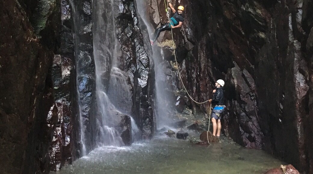 Rappelling at El salto water falls to the bottom of canyon. It’s located in 45 minutes south of San Juan.